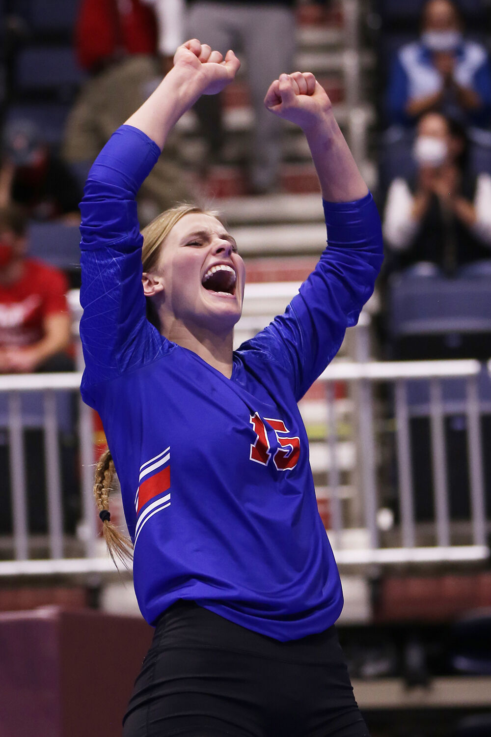 Tinley Pierson throws her hands up in celebration for a Kaycee point